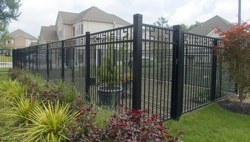Black ornamental iron fence near me with decorative scrollwork