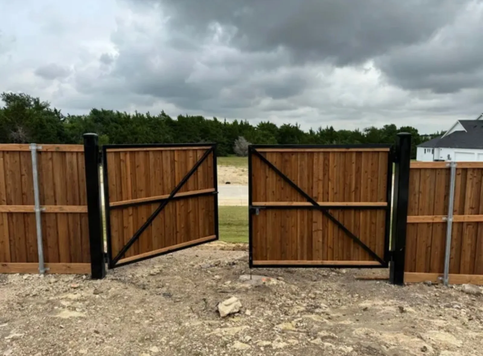 Cedar Gate Installation project in Pearland, TX by Forged Fence & Deck