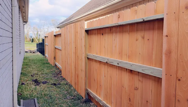 Cedar privacy fence back support structure — fence company near me