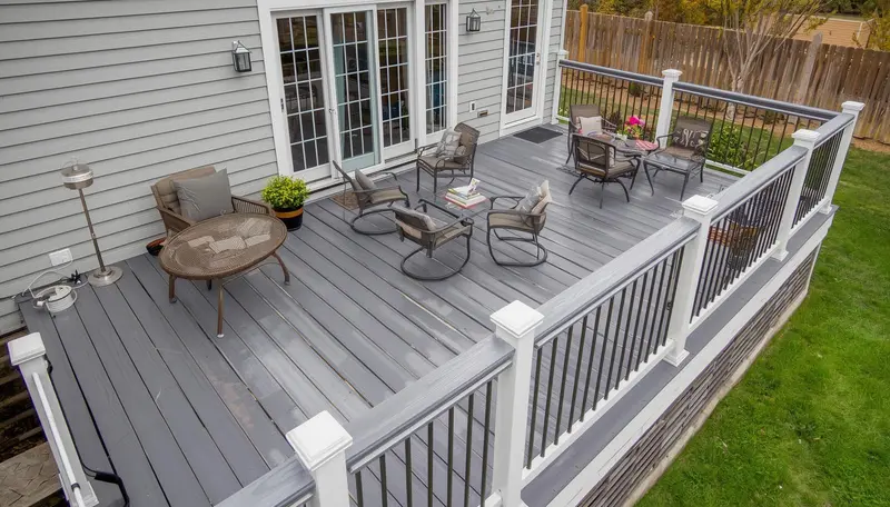 Gray composite deck near me with white railings — Pearland TX