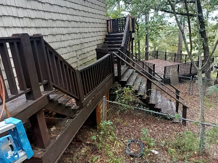 Rotted deck stairs before replacement by Forged Fence & Deck in Pearland, TX
