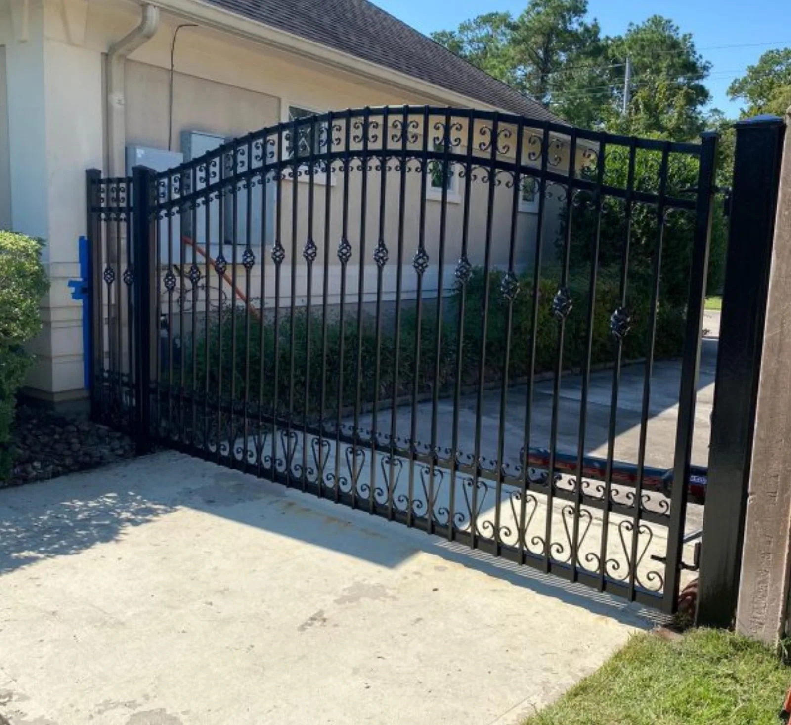 Ornate Wrought Iron Arched Driveway Gate