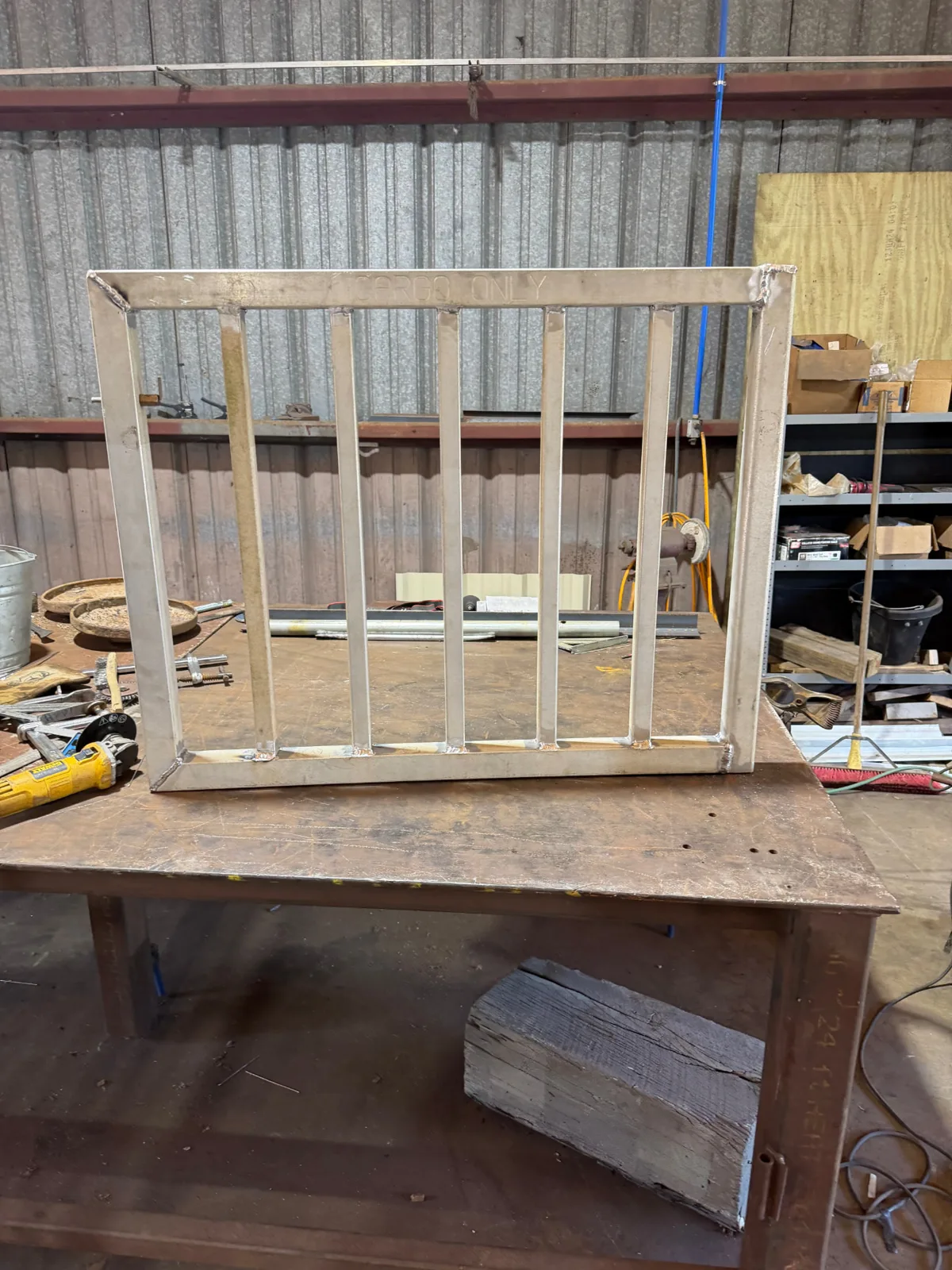 Welded galvanized steel walk gate frame with square pickets built by Forged Fence & Deck in Pearland, TX